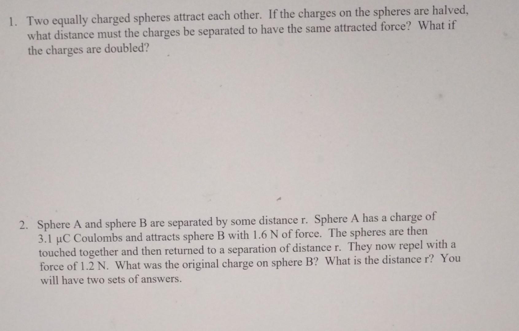 Solved Two Equally Charged Spheres Attract Each Other If Chegg