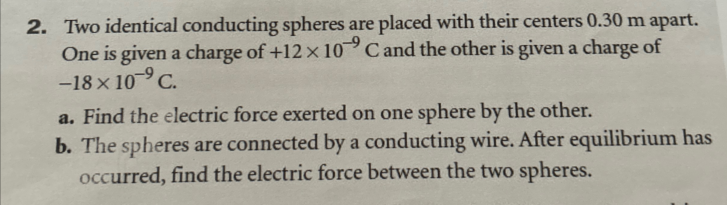 Solved Two Identical Conducting Spheres Are Placed With Chegg