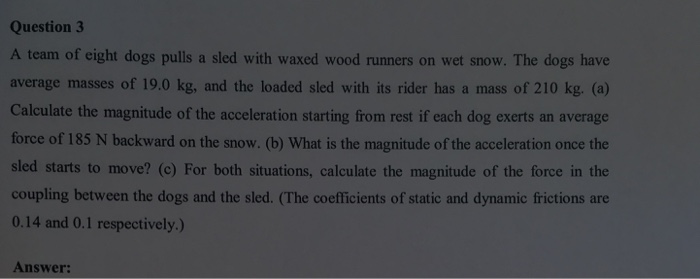 a team of eight dogs pulls a sled