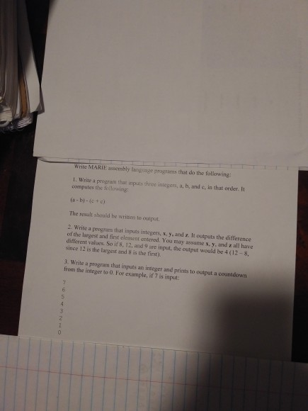 Write MARIE assembly language programs that do the following: I. Write a program that inputs three integers, a, b, and c, in