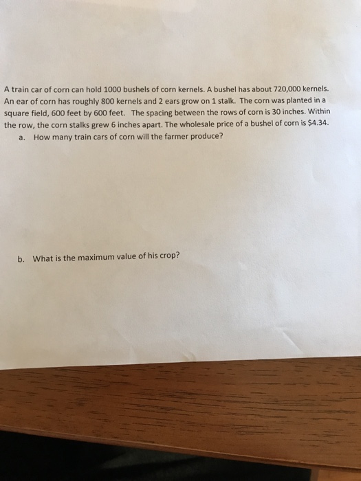 Solved A train car of corn can hold 1000 bushels of corn