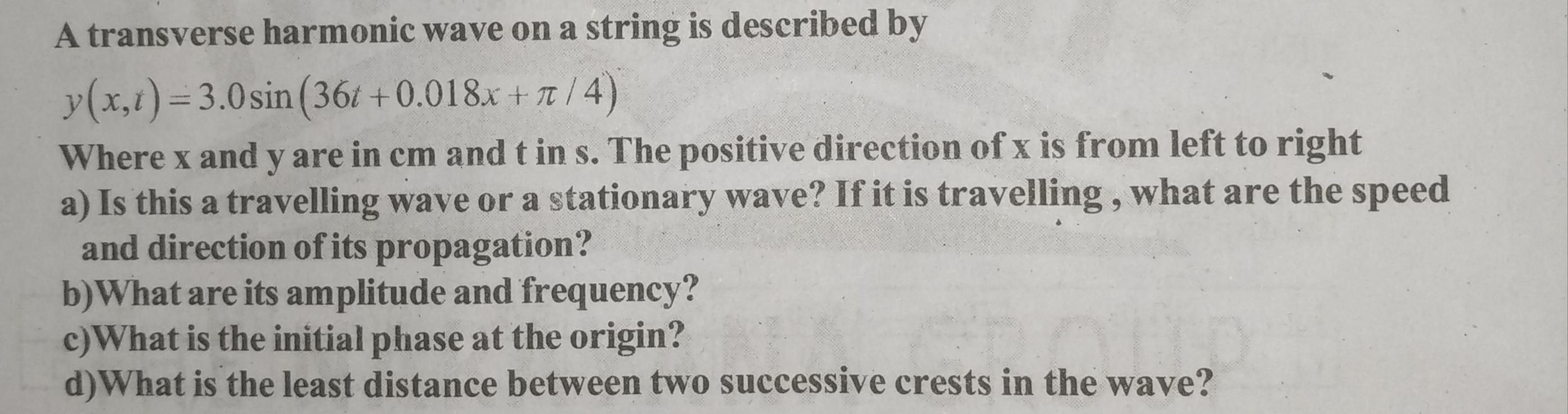 Solved S. A transverse harmonic wave on a string is | Chegg.com