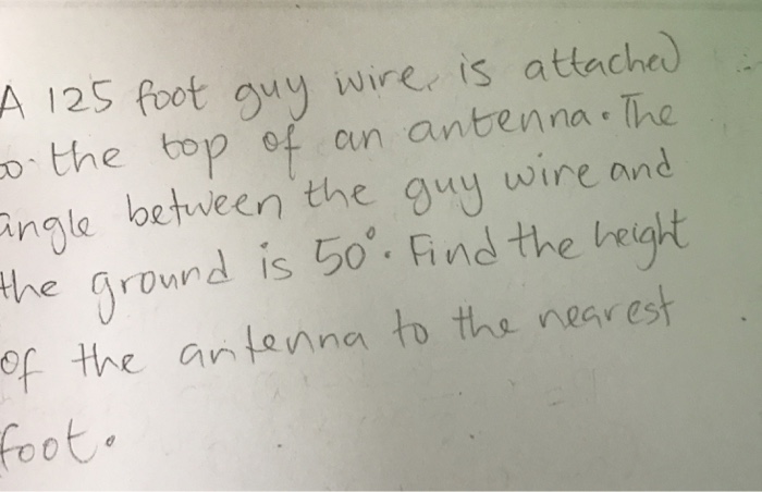 Solved A 124 foot guy wire is attached to the top of an | Chegg.com