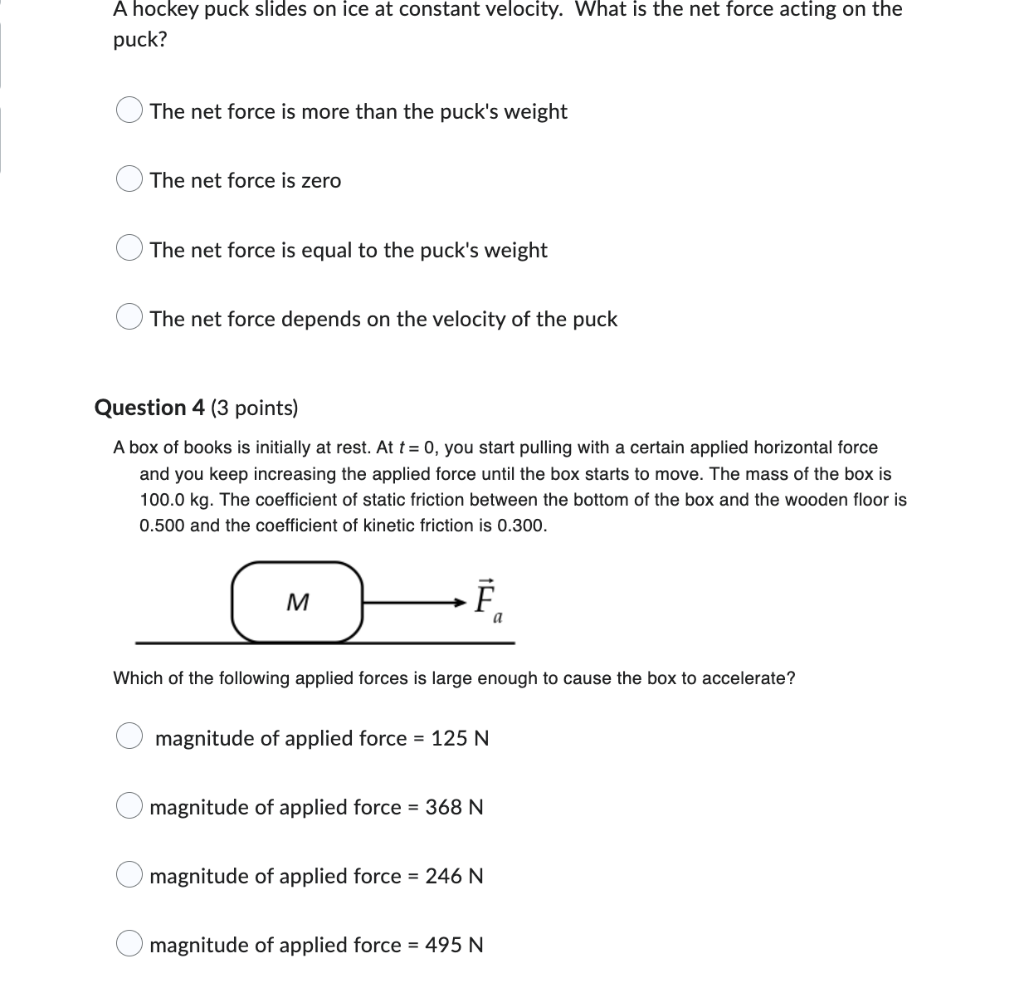 Solved A hockey puck slides on ice at constant velocity.