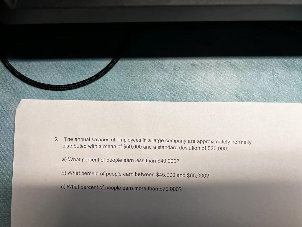 Solved 5. The annual salaries of employees in a large | Chegg.com
