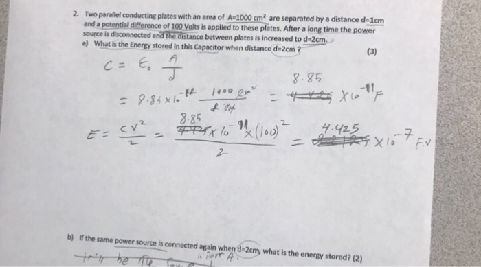 Solved Two parallel conducting plates with an area of A = | Chegg.com
