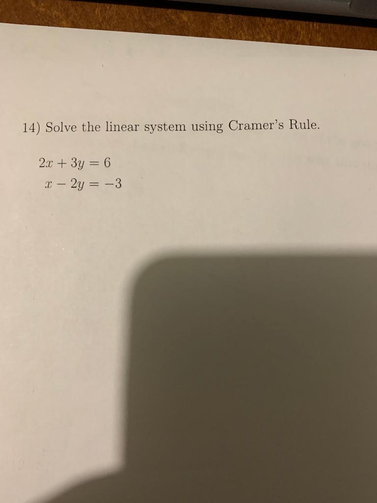 Solved 14) Solve the linear system using Cramer's Rule. 2x + | Chegg.com