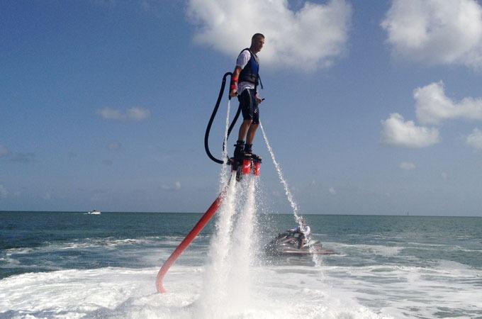 Solved Let's assume that we have a water jetpack that has | Chegg.com