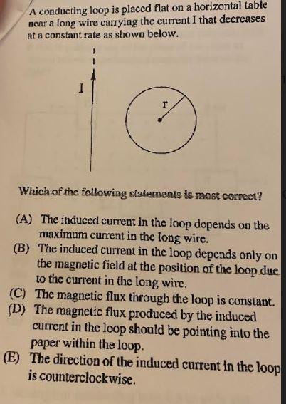 Solved A conducting loop is placed flat on a horizontal | Chegg.com