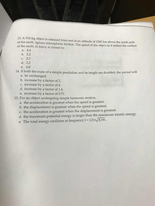 Solved 13. A 910-kg object is released from rest at an | Chegg.com