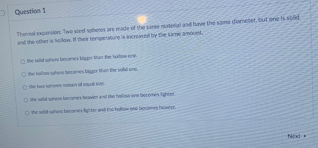 Solved Question 1 Thermal expansion: Two steel spheres are | Chegg.com