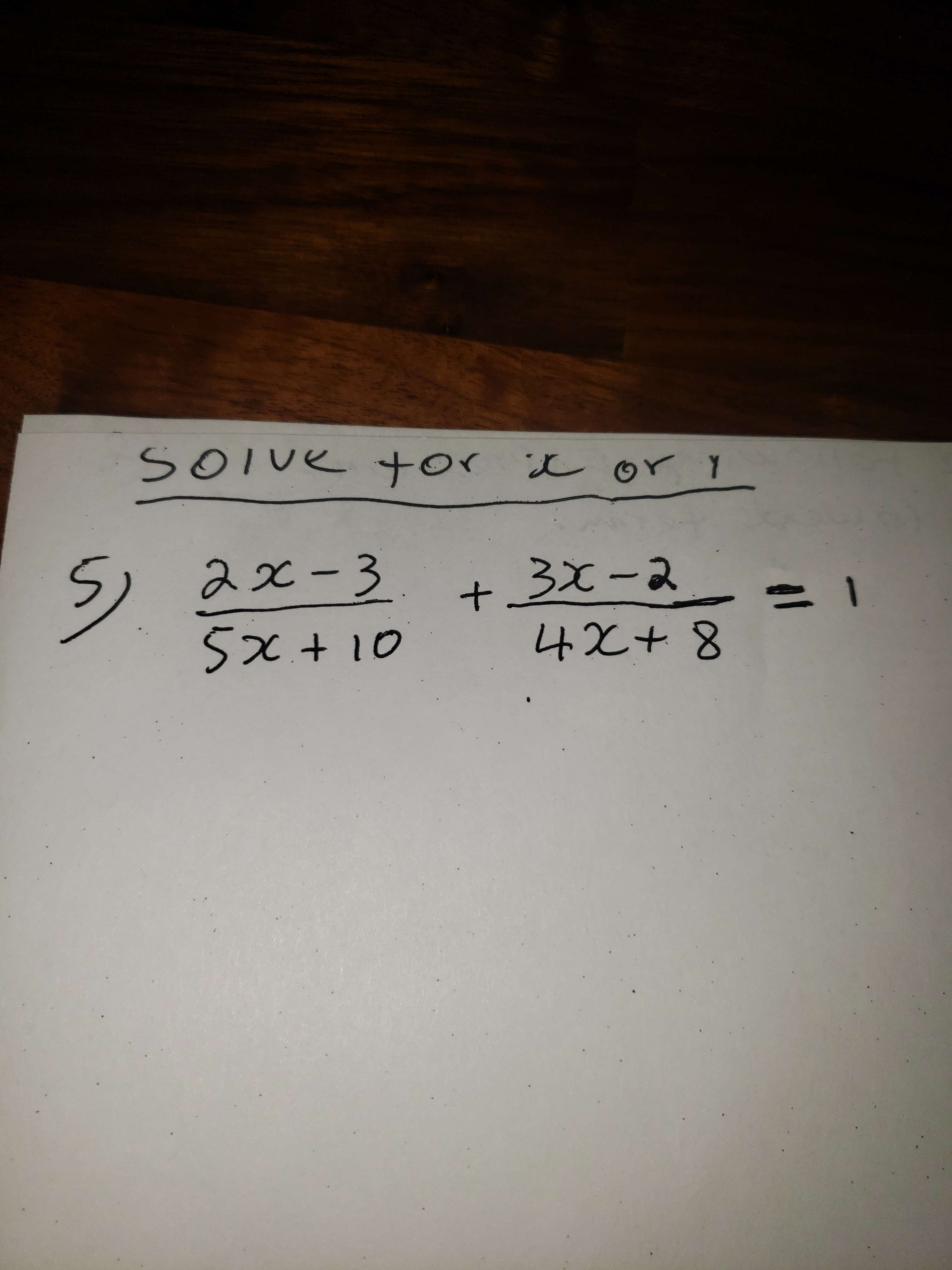 Solve for \( x \) or \( y \) \[ \frac{2 x-3}{5 x+10}+\frac{3 x-2}{4 x+8}=1 \]