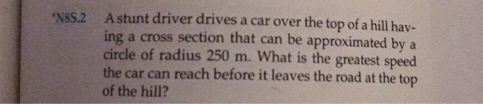 Solved A Stunt Driver Drives A Car Over The Top Of A Hill | Chegg.com