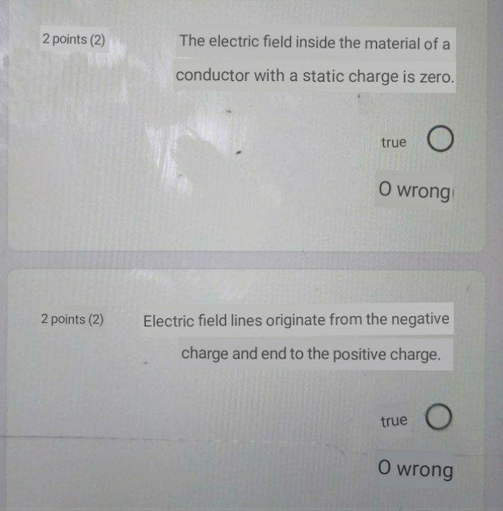 Solved 2 points (2) The electric field inside the material | Chegg.com