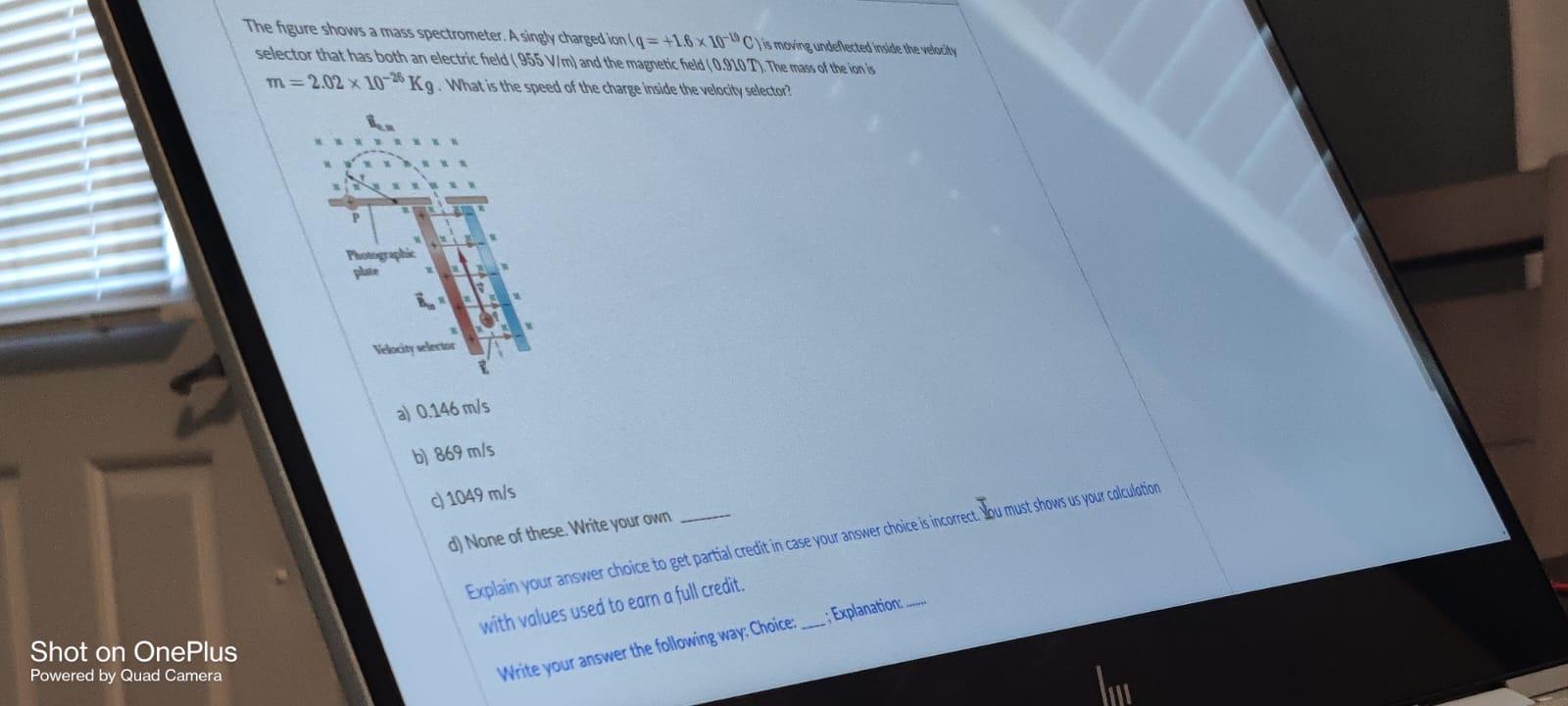Solved The figure shows a mass spectrometer. A singly | Chegg.com
