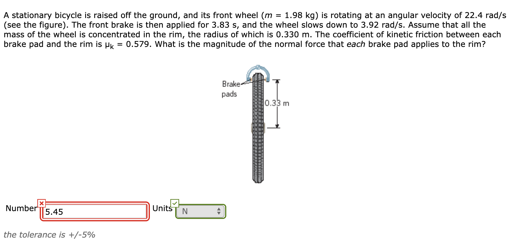 A Stationary Bicycle Is Raised Off The Ground