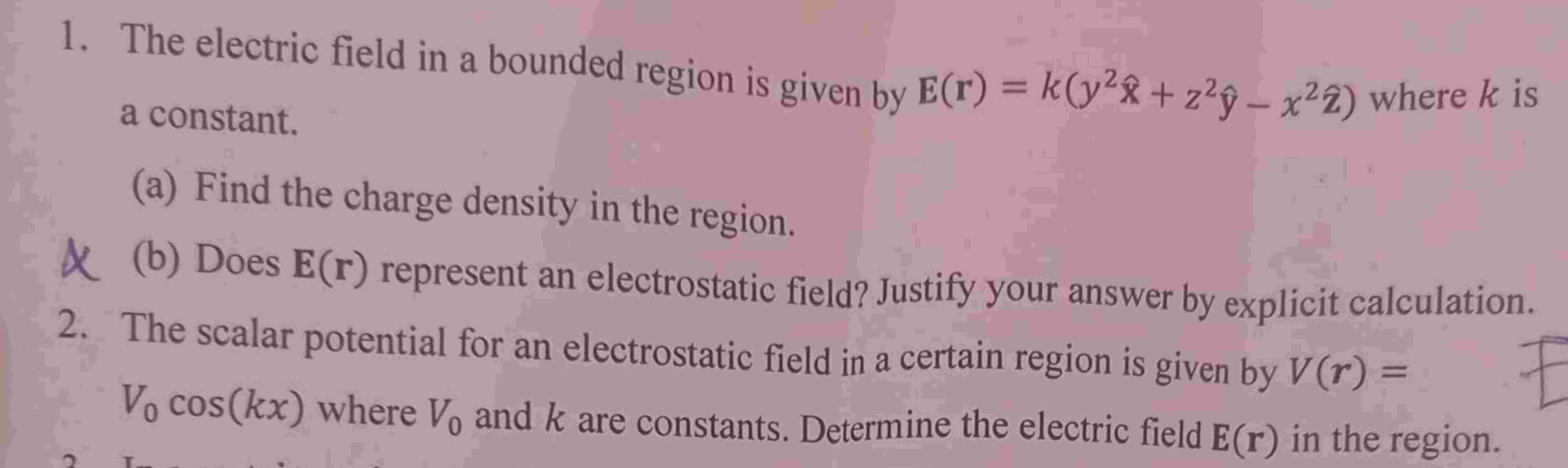 Solved The electric field in a bounded region is given by | Chegg.com