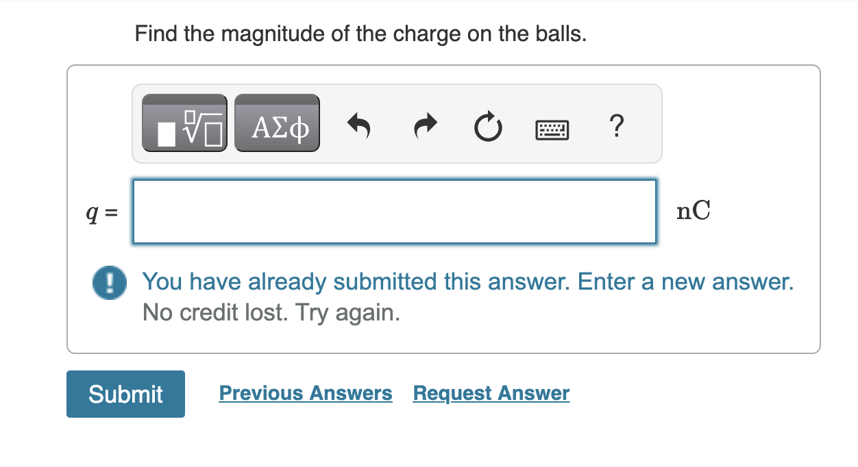 Two small plastic balls hang from threads of