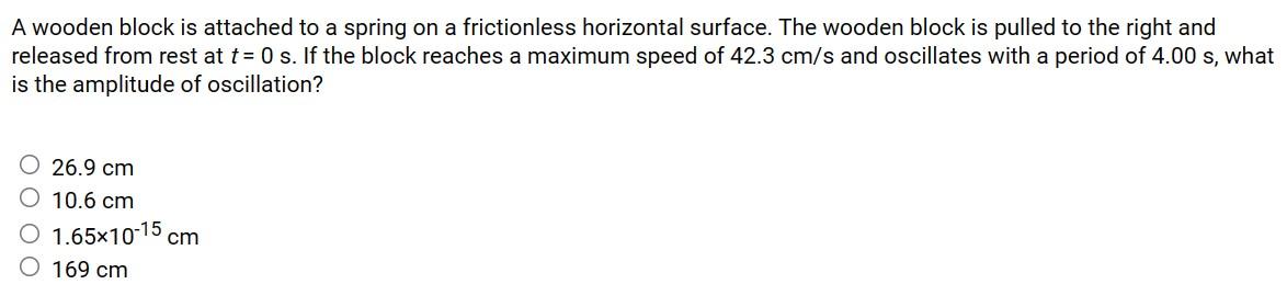 Solved A wooden block is attached to a spring on a | Chegg.com