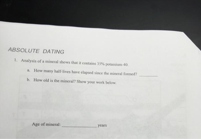 Solved ABSOLUTE DATING 1? Analysis of a mineral shows that | Chegg.com