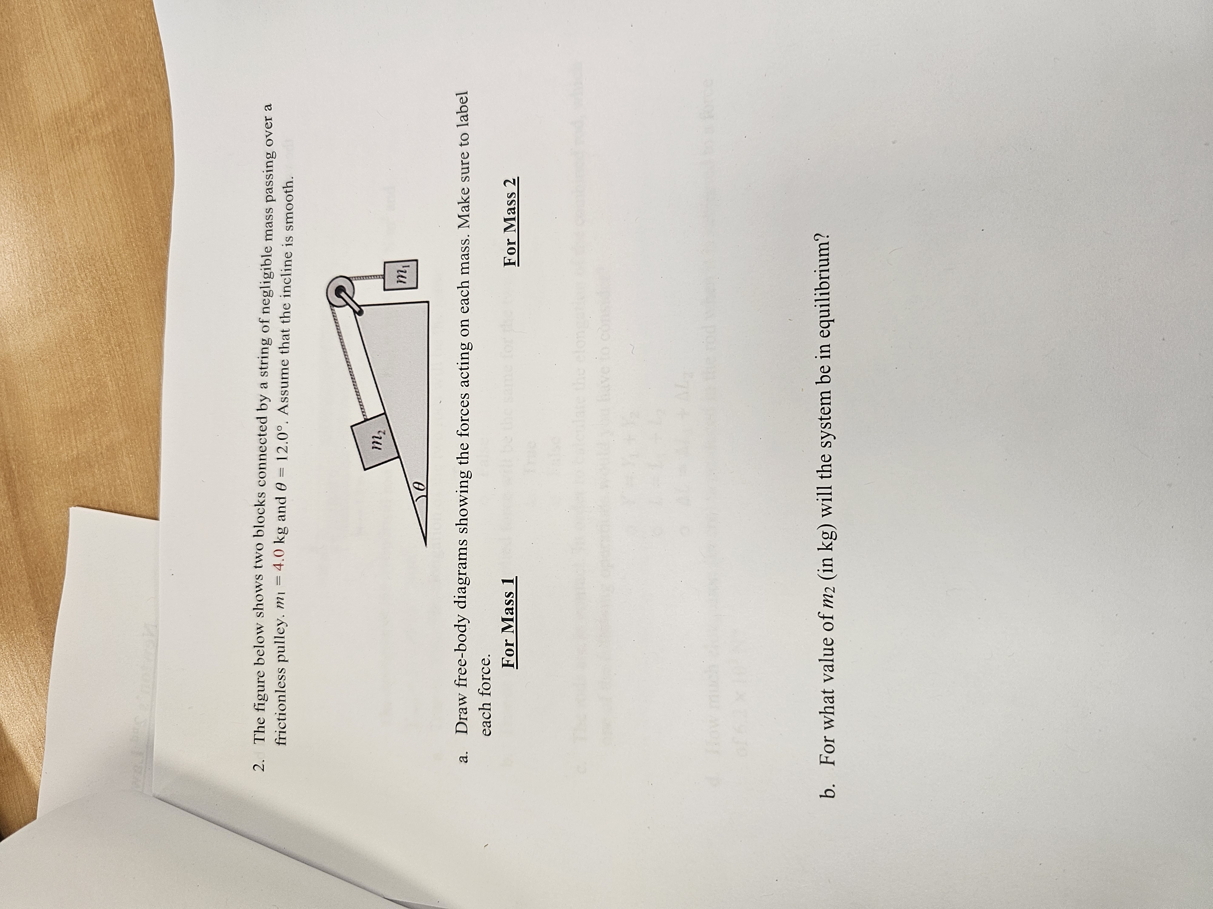 The figure below shows two blocks connected by ﻿a | Chegg.com