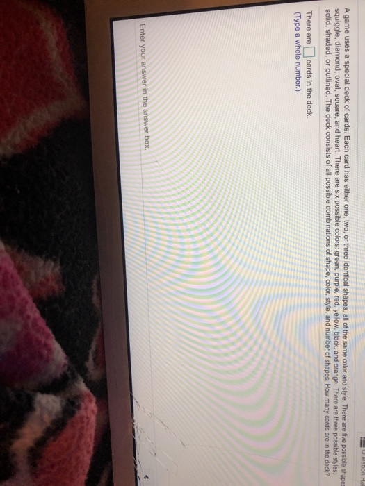 Solved A game uses a special deck of cards. Each card has