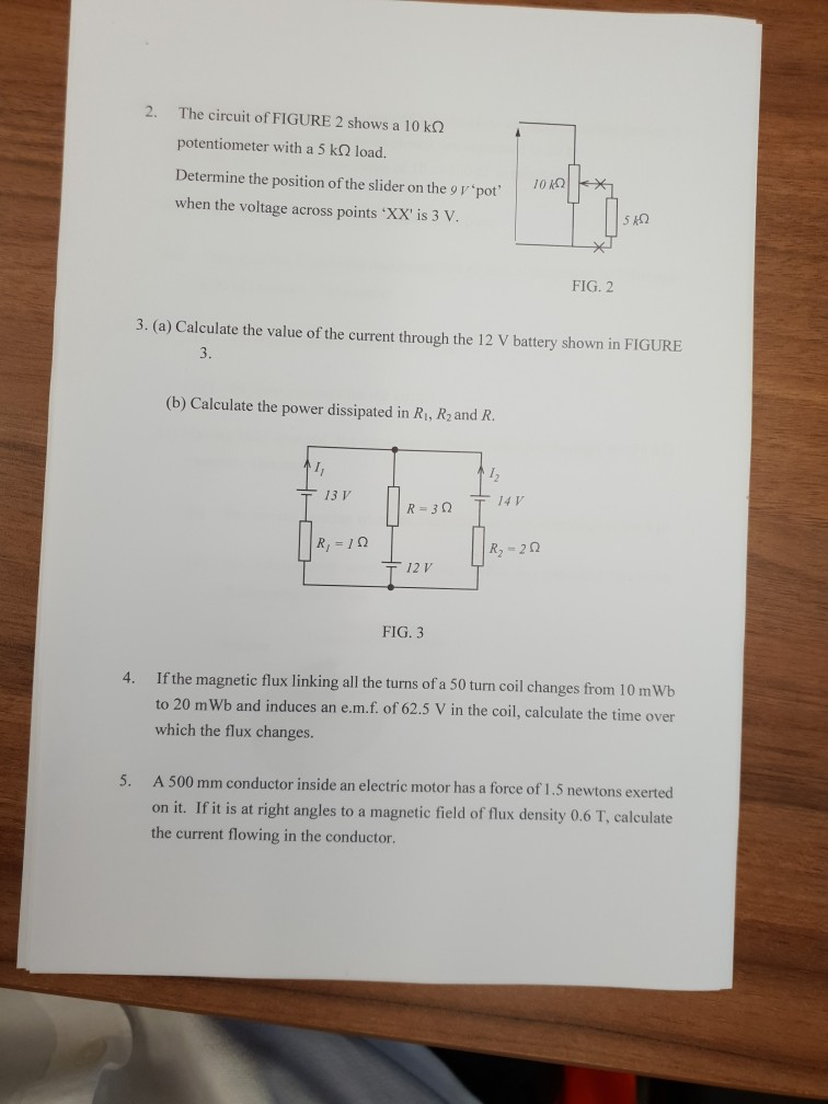 Solved 2. The circuit of FIGURE 2 shows a 10 kQ | Chegg.com