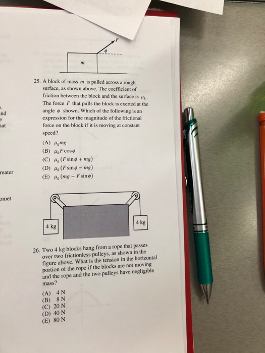 25. A block of mass m is pulled across a rough