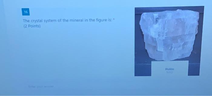 Solved 16 The crystal system of the mineral in the figure | Chegg.com