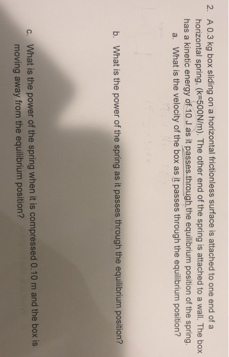 Solved 2. A 0.3 kg box sliding on a horizontal frictionless | Chegg.com