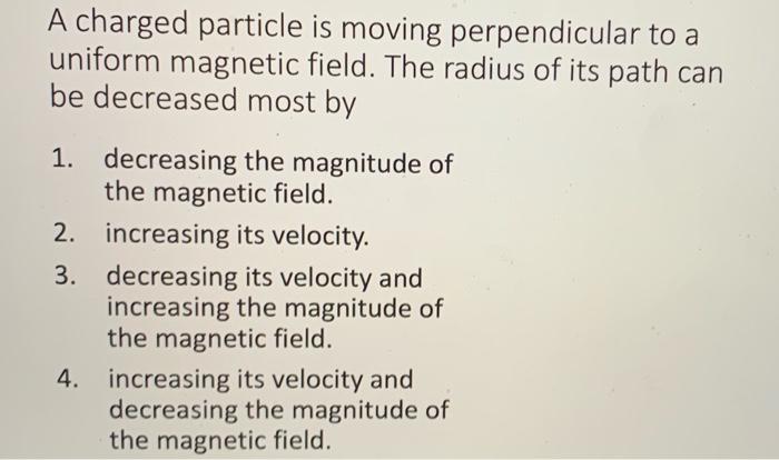 Solved A charged particle is moving perpendicular to a | Chegg.com