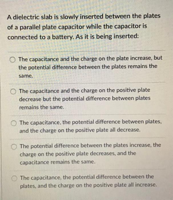 Solved A Dielectric Slab Is Slowly Inserted Between The | Chegg.com