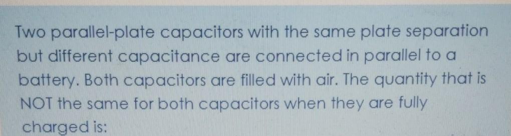 Two parallel-plate capacitors with the same plate separation but different capacitance are connected in parallel to a battery