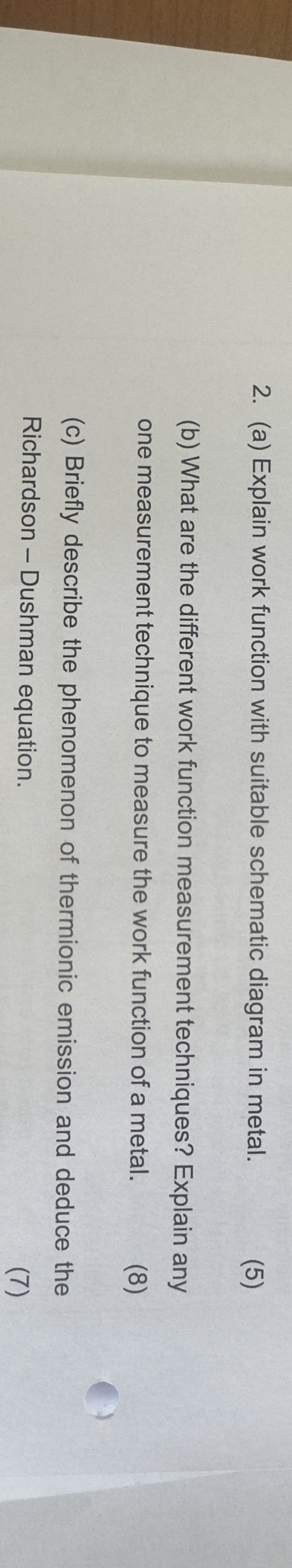 Solved (a) ﻿Explain work function with suitable schematic | Chegg.com