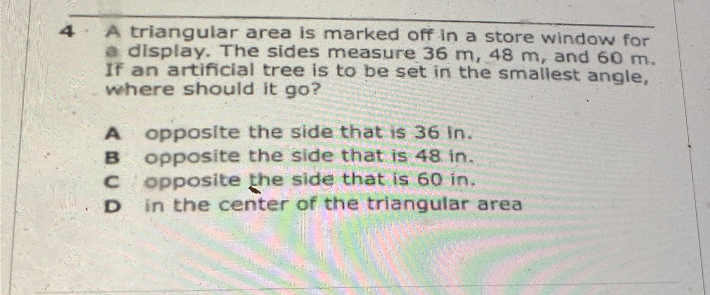 Solved 4 ﻿A triangular area is marked off in a store window | Chegg.com