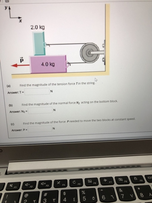 Solved he two blocks shown in the figure are attached to | Chegg.com