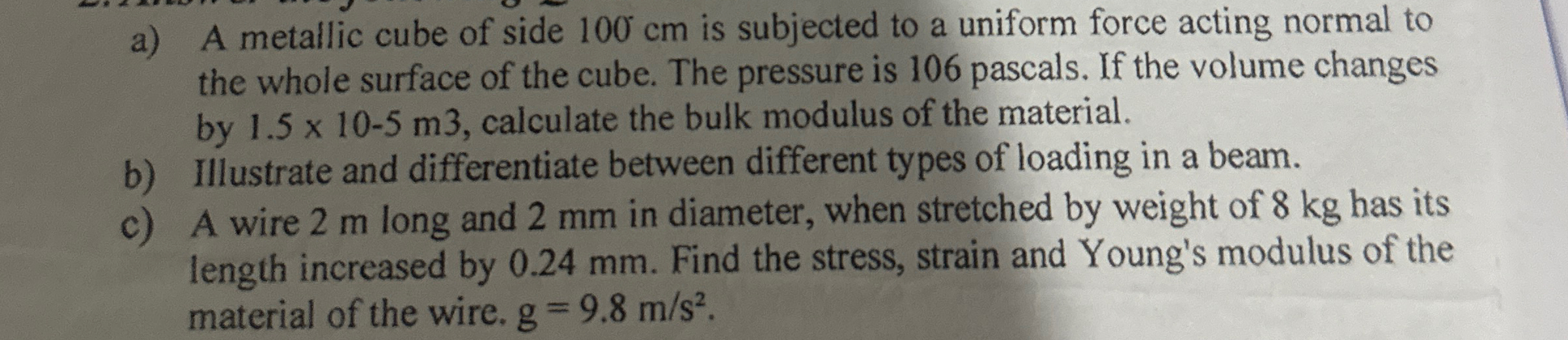 Solved a) ﻿A metallic cube of side 100cm ﻿is subjected to a | Chegg.com