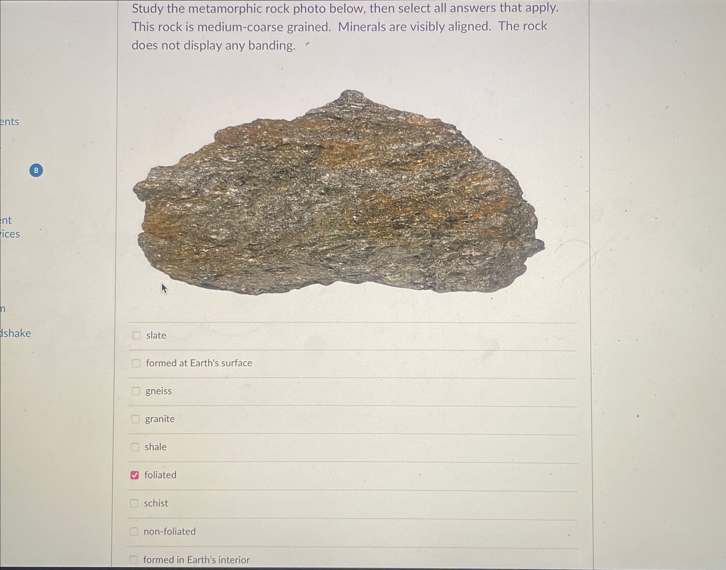 Solved Study the metamorphic rock photo below, then select | Chegg.com