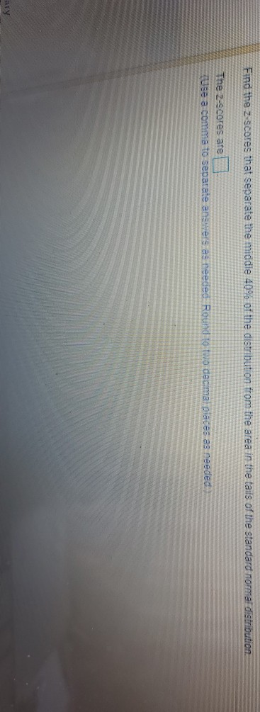 Solved Find the z-scores that separate the middle 40% of the | Chegg.com