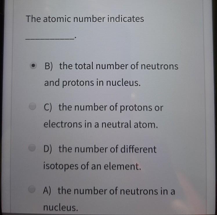 the total number of protons and neutrons in a nucleus is called