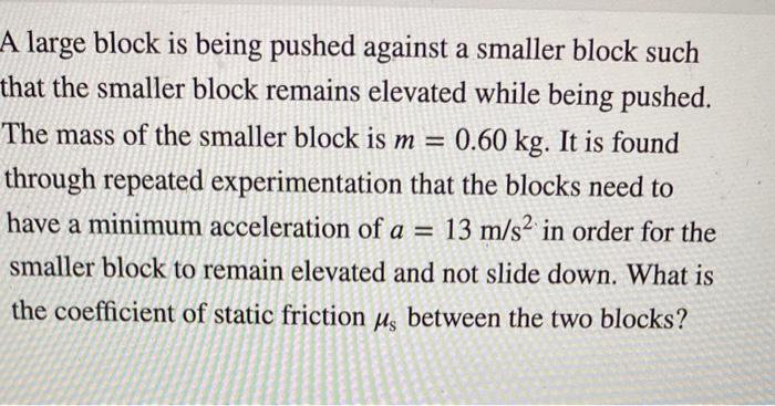 Solved A large block is being pushed against a smaller block | Chegg.com