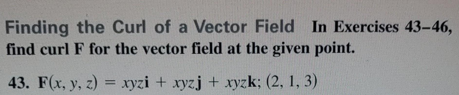 find the curl of the vector field at the given point