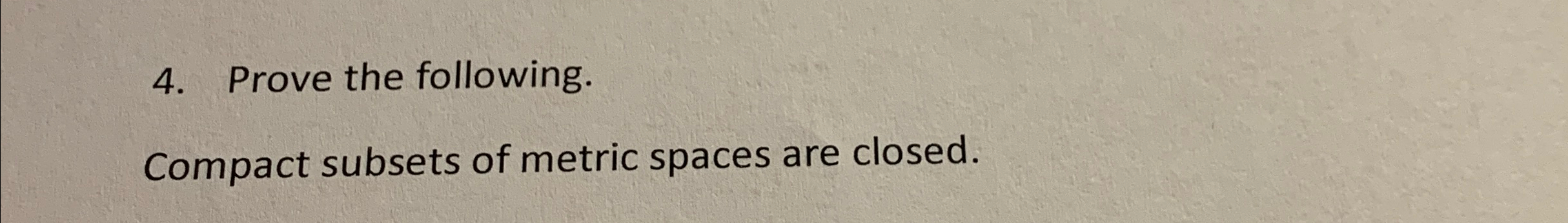 compact subsets of metric spaces are closed