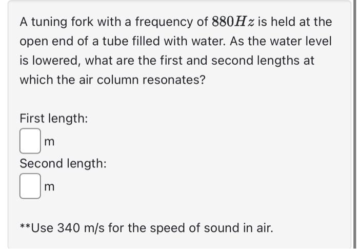 Solved A tuning fork with a frequency of 880 Hz is held at | Chegg.com