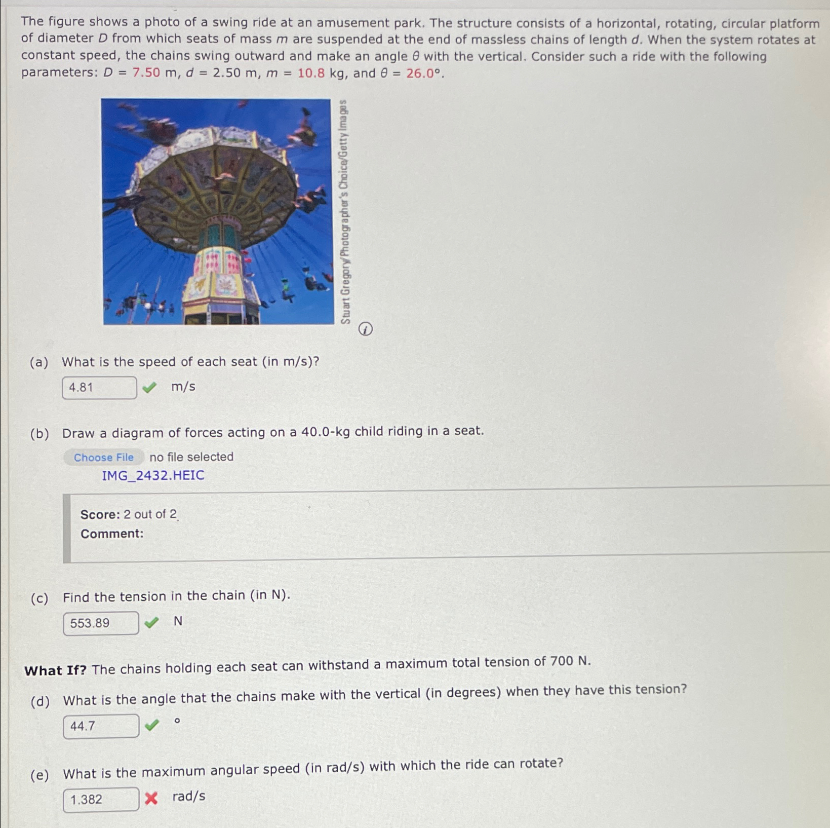Solved The figure shows a photo of a swing ride at an | Chegg.com