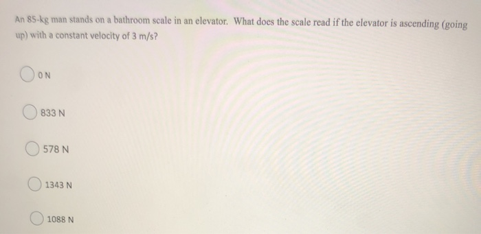 Solved An 85 kg man stands on a bathroom scale in an | Chegg.com