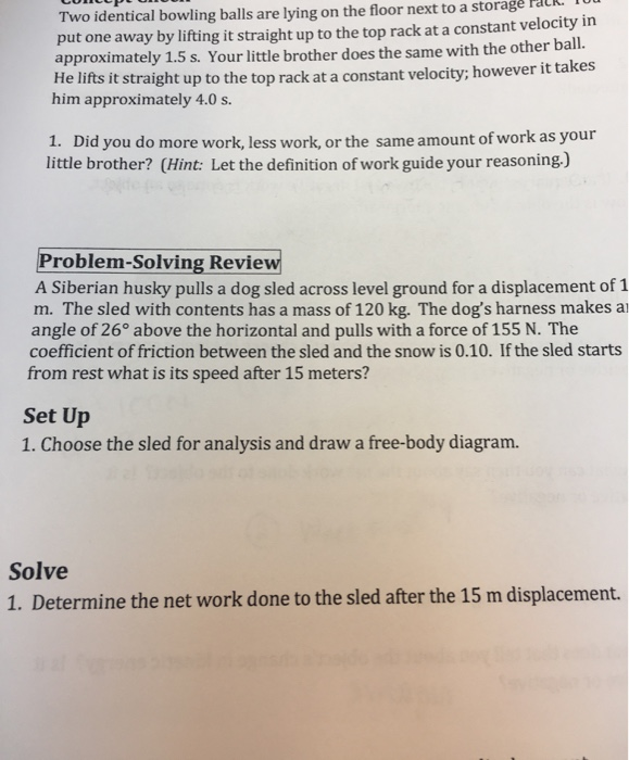 Two identical bowling balls are lying on the floor