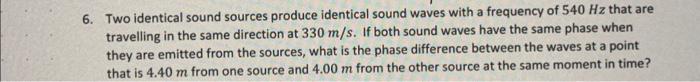 Two identical sound sources produce identical sound waves with a frequency of \( 540 \mathrm{~Hz} \) that are travelling in t