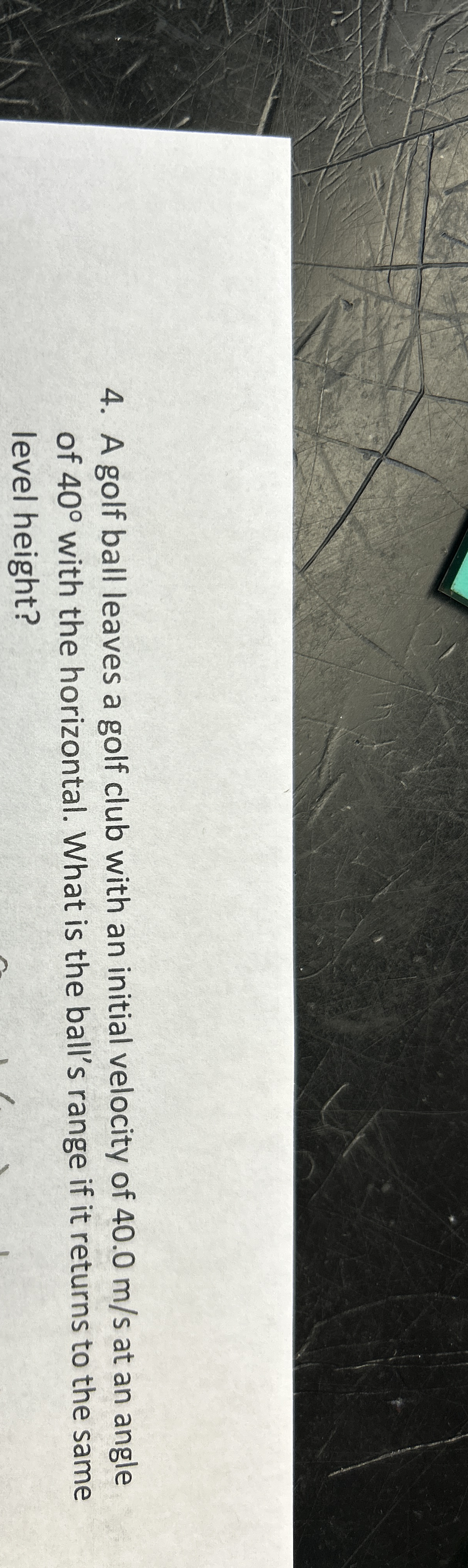 A golf ball leaves a golf club with an initial