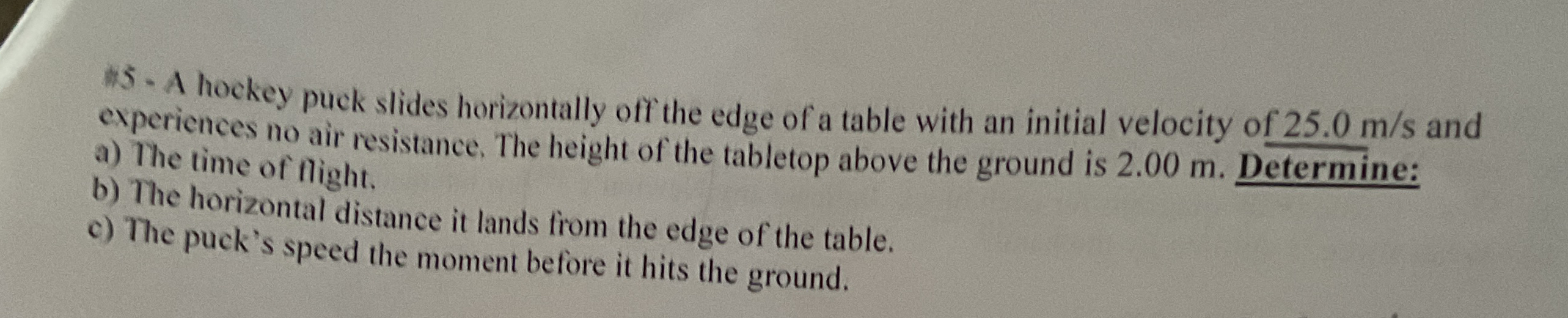 Solved 5 ﻿A hockey puck slides horizontally off the edge